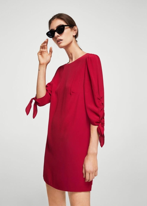 Sleeve knotted sweater